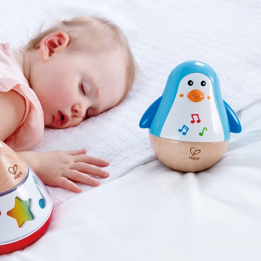 Hape Penguin Musical Wobbler dla niemowląt